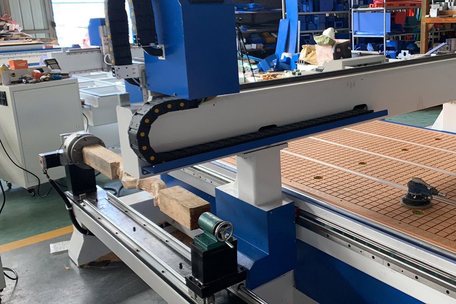 CNC Router 4 axis making a wood cylinder sample